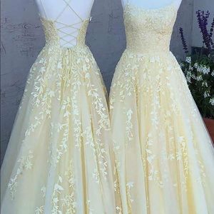 Yellow prom dress, never been worn because wrong size. Beautiful tulle, yellow.